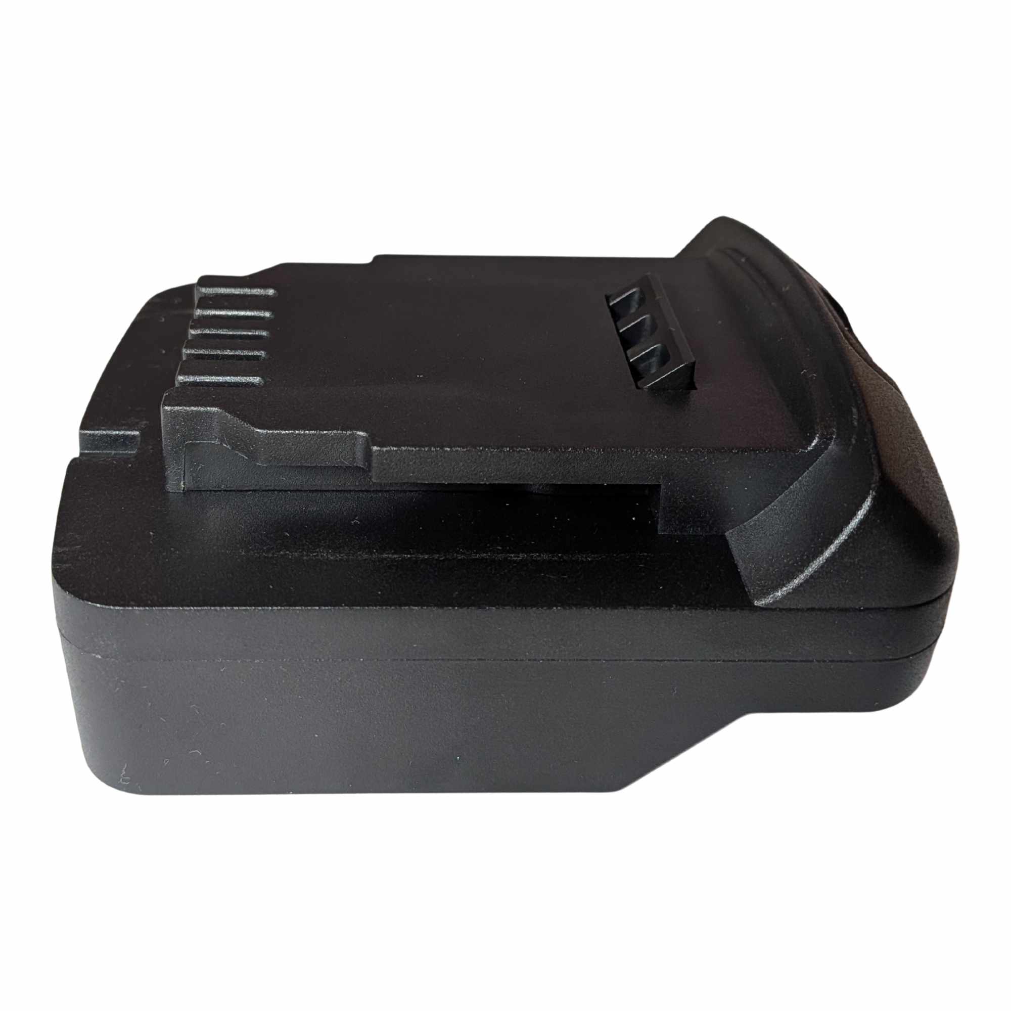 Parkside X20V to DeWalt 20V MAX battery adapter - side view showing the DeWalt tool-side platform, rail and terminal slots