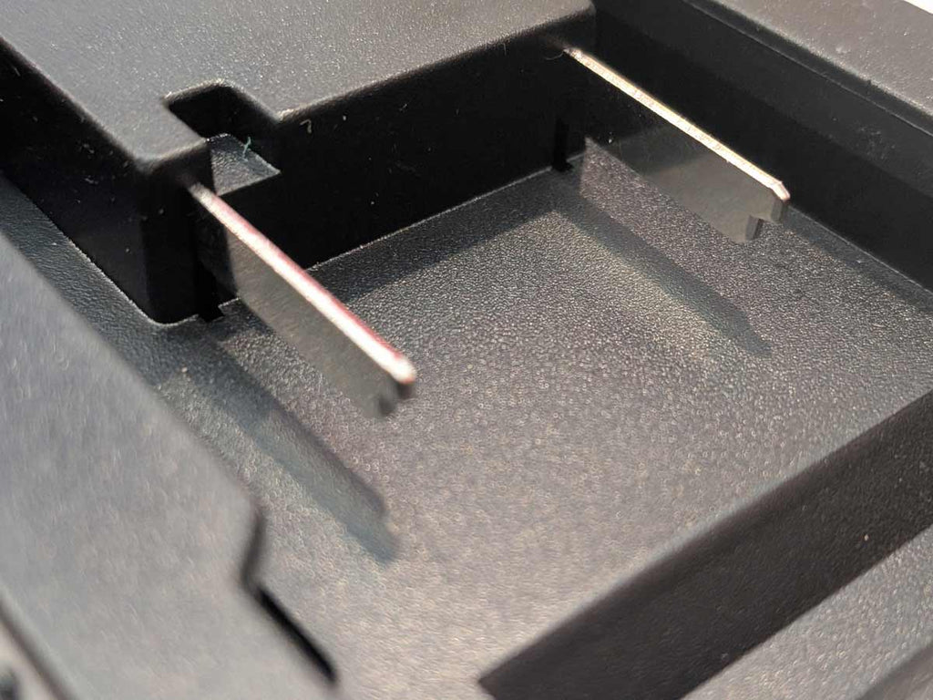 Einhell 18V PXC to RIDGID Plumbing battery adapter - close-up of the battery-side terminal blades