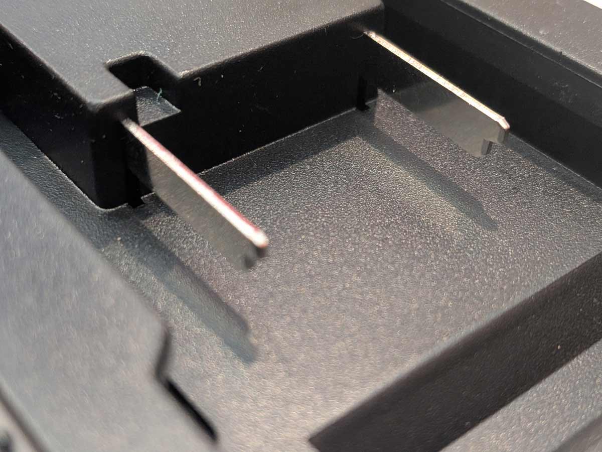 Einhell 18V PXC to RIDGID Plumbing battery adapter - close-up of the battery-side terminal blades