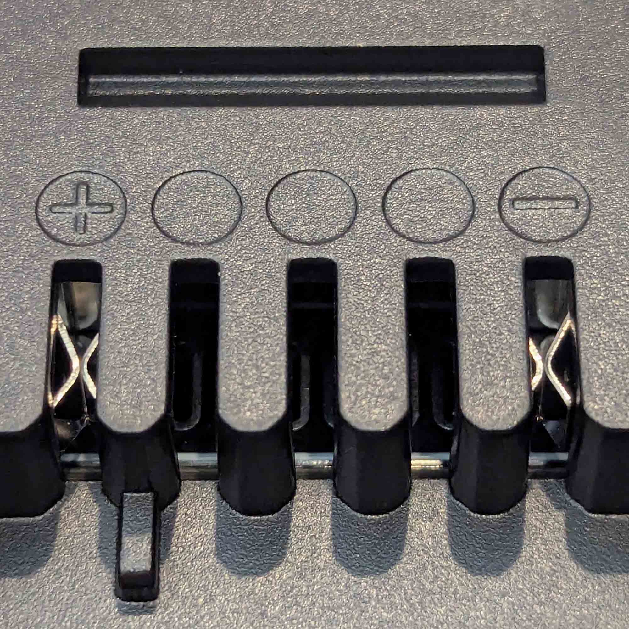 Makita 18V LXT to Ozito 18V PXC battery adapter - close-up of the Ozito tool-side connection with copper spring contacts