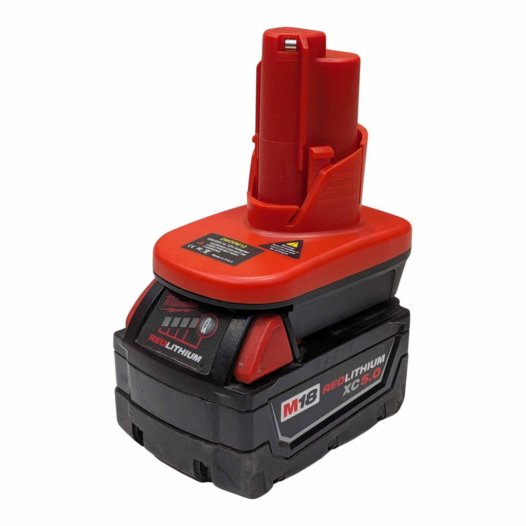 Milwaukee M18 to Milwaukee M12 battery adapter - fitted to the Milwaukee M18 battery, tool-side stem upward